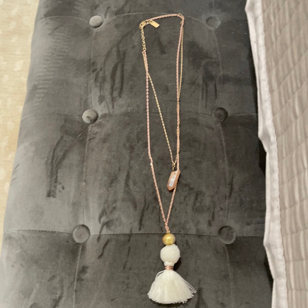 Pink and gold long necklace.
